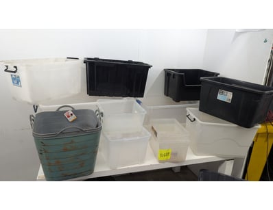 Large collection of plastic storage containers in ...