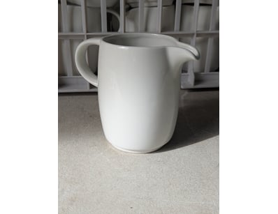 Milk jugs, white ceramic, 12cm high

SOLD AS LOT...
