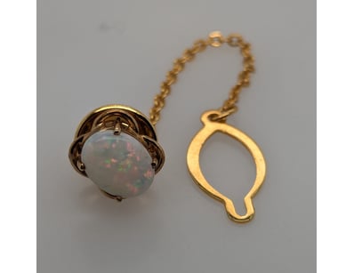 9CT & BASE METAL CLIP BACK AND OPAL TIE PIN


5...