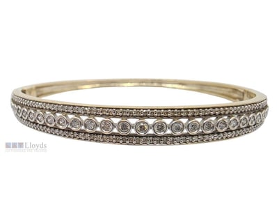 9CT YELLOW GOLD TWO-TONE DIAMOND BANGLE – THREE RO...