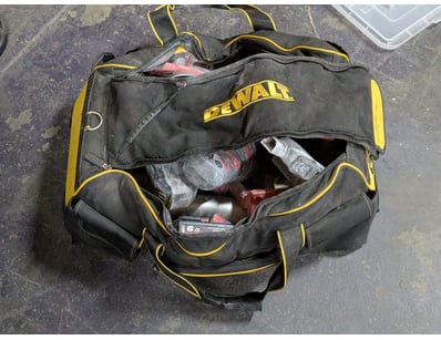 Tools, including assorted Milwaukee power tool ski...
