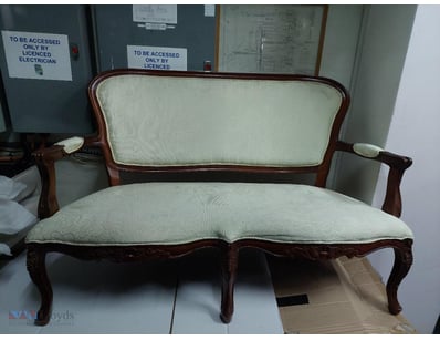 Elegant Victorian-style settee featuring a carved ...