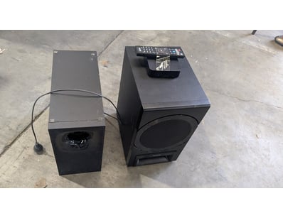 Home theatre speaker system comprising two active ...
