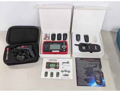 Two KEYDIY automotive diagnostic and key programmi...