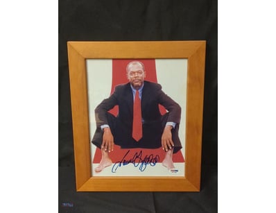 THIS FRAMED, SIGNED PHOTOGRAPH DEPICTS ACTOR SAMUE...