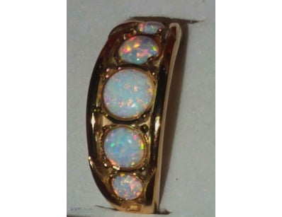 18 TCW GOLD PLATED OPAL RING     

Pretty Piece Wi...