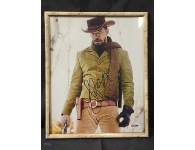 THIS FRAMED COLLECTIBLE FEATURES AN AUTOGRAPHED PH...