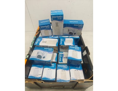 Toiletries, including soap dispenser, toothbrushes...