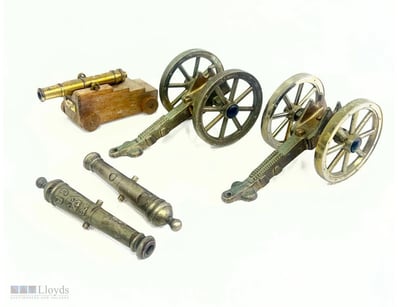 COLLECTION OF BRASS MINIATURE CANNONS

Item Size: ...