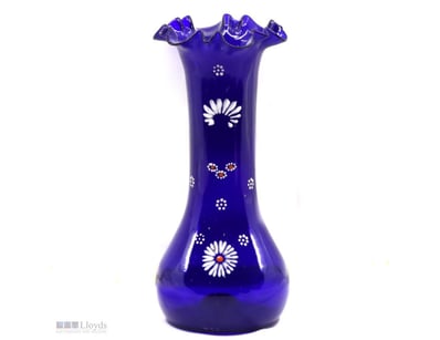 COBALT BLUE VINTAGE GLASS VASE.      

The Vase Fe...