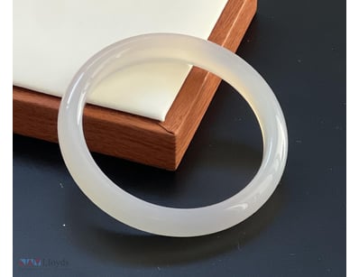 NATURAL WHITE CHALCEDONY 
BANGLE  

Total Item Wei...
