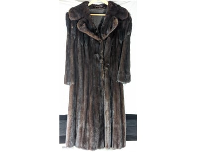 HECK KG FUR COAT

Coat Features Various Tail Decor...