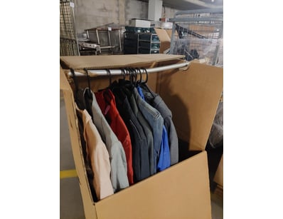 Portable clothing display rack featuring a sturdy ...