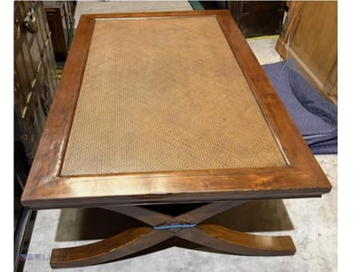 Juwood kang table with crossed legs. Note rattan m...