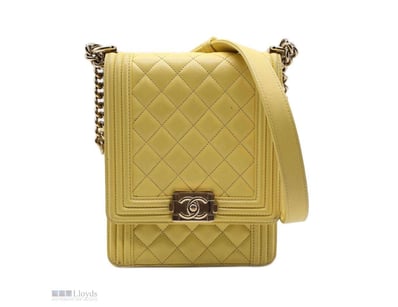 CHANEL YELLOW LAMBSKIN NORTH SOUTH BOY FLAP

Exter...