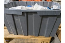 260 · Large grey plastic storage bin containing