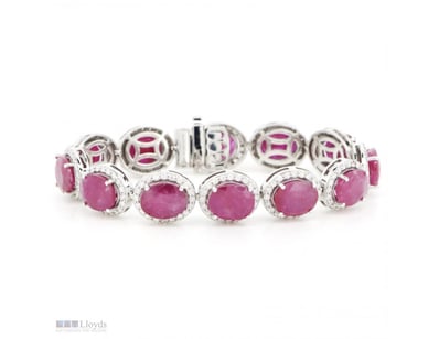 14K WHITE GOLD, RUBY AND DIAMOND, HALO BRACELET.  ...