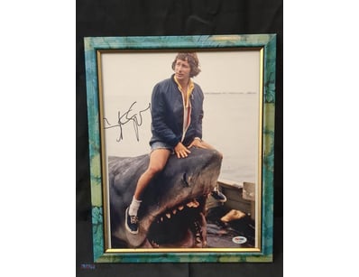 THIS FRAMED PHOTOGRAPH SHOWS DIRECTOR STEVEN SPIEL...