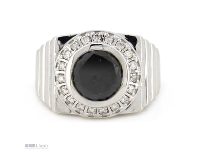 14K WHITE GOLD, BLACK DIAMOND, GENTS RING.      

...