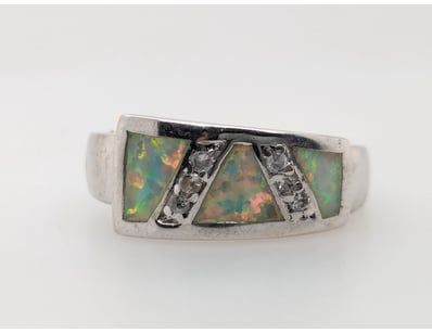 BASE METAL CZ 7 SYNTHETIC OPAL RING


583010+27...