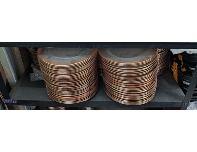 Substantial collection of copper-rimmed dinnerware...