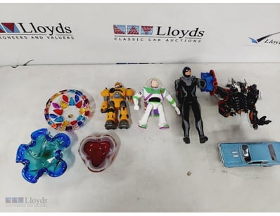 ASSORTED ITEMS INCLUDING ASHTRAYS AND TOYS

Condit...
