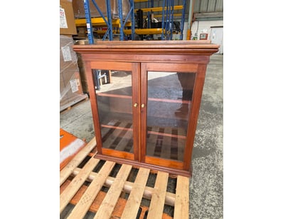 Elegant timber display cabinet featuring two glass...