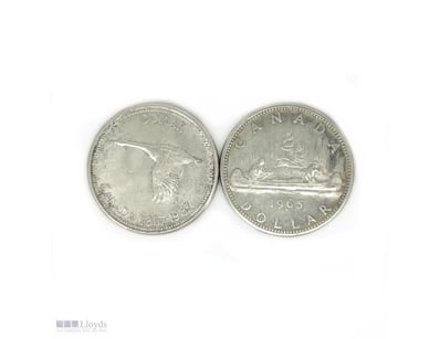 2 X CANADIAN SILVER DOLLAR COINS.      

1 X 1965 ...