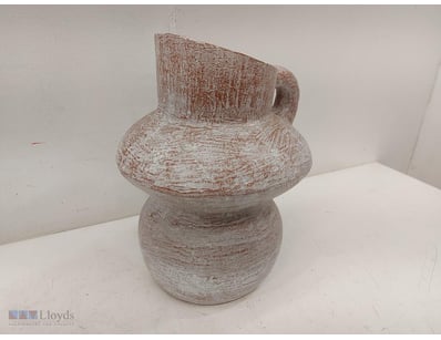 Rustic ceramic pitcher featuring a two-tiered bulb...