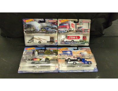 4X HOT WHEELS PREMIUM TEAM TRANSPORT

Item Size:...