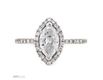 14K WHITE GOLD AND DIAMOND, HALO RING.      

The ...