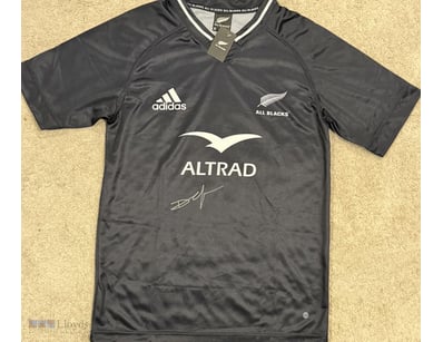 DAN CARTER SIGNED NZ ALL BLACKS JERSEY

A New Zeal...