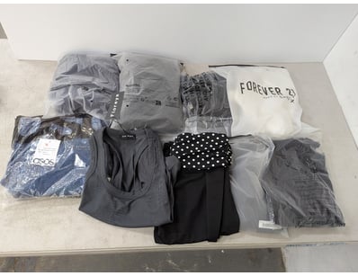 Assorted clothing includes jeans, singlet, pants a...