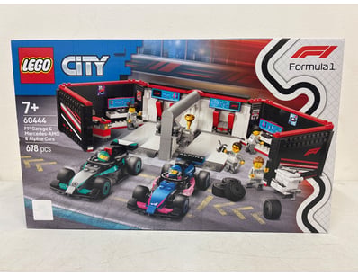 LEGO City Formula 1 set 60444 featuring an F1 Gara...