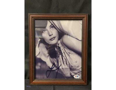 AUTOGRAPHED PHOTOGRAPH OF LIV TYLER.

Item Size: H...