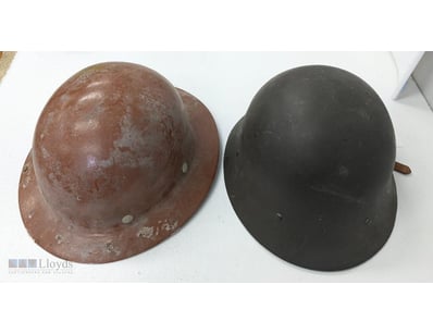 WWI BRITISH STEEL COMBAT HELMET WITH LEATHER CHINS...
