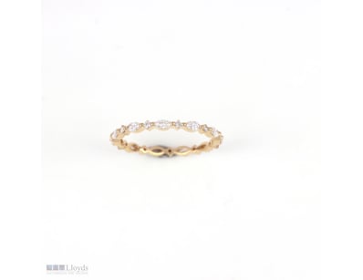 0.57 CT ROUND & MARQUISE ETERNITY BAND IN 18KT YEL...