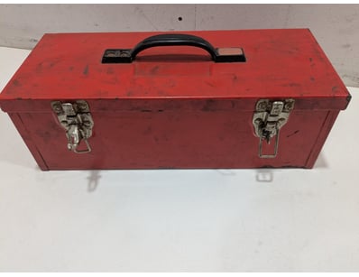 red metal toolbox with black carry handle and dual...
