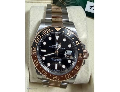 ROLEX GMT ROOT BEER  

Brand: Rolex 
Model Number:...