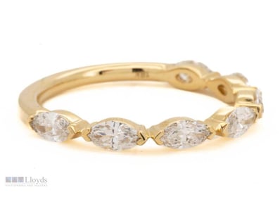 18K YELLOW GOLD DIAMOND BAND     

 7 Lab Grown Ma...
