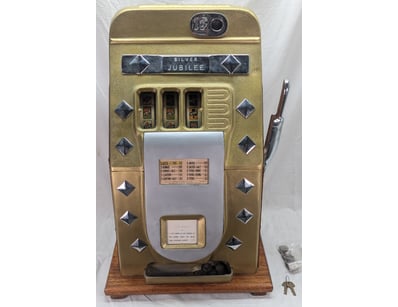 VINTAGE SILVER JUBILEE SLOT MACHINE

Item Size: ...