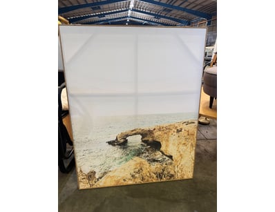 Canvas art print featuring a striking coastal land...
