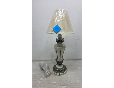 Elegant vintage table lamp featuring a cream-colou...