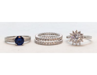 SILVER ROUND BRILLIANT CUT FLORAL HALO CLUSTER RIN...