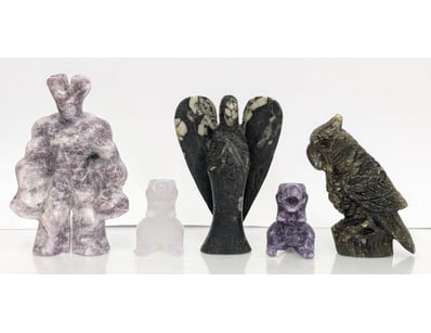 COLLECTION OF FIVE CARVED CRYSTAL FIGURATIVE SCULP...