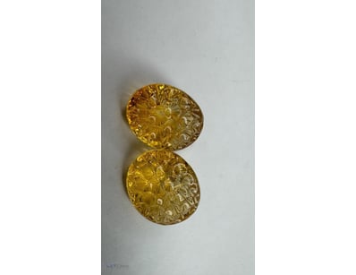 POLISHED CARVED CITRINE 23.65CTS


665336+62

