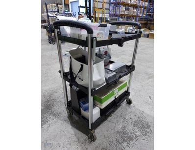 A cart of electronics components and miscellaneous...
