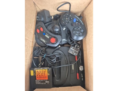 Retro Sega gaming bundle featuring Desert Strike c...