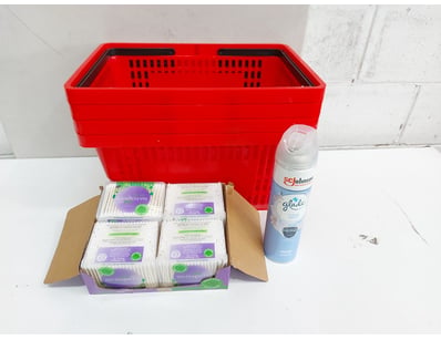Red plastic shopping basket set comprising four st...