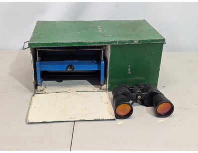 Portable camping oven and binoculars 

SOLD AS L...